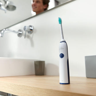Buy Philips,Philips Sonicare DailyClean 2100 Rechargeable Electric Toothbrush, Dark Blue - Gadcet.com | UK | London | Scotland | Wales| Ireland | Near Me | Cheap | Pay In 3 | Health & Beauty