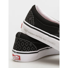 6526b682e719a624d41b5e41_1293054-vans-x-krooked-skate-slip-on-shoes-by-natas-for-ray-black_1764537409977.jpg