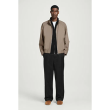 6526b682e719a624d41b5e41_cos-minimal-suede-traiers_1763413384359.png
