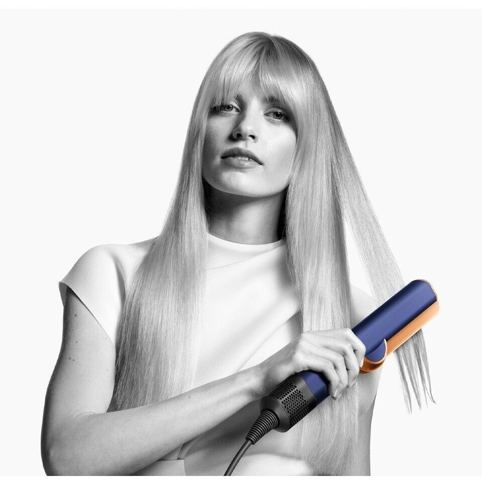 6526b682e719a624d41b5e41_dyson-airstrait-night-blue-copper-3_1793286209907.jpg