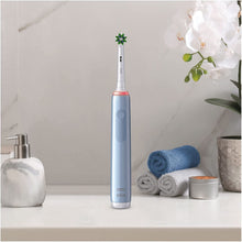 Oral-B,Oral-B Pro 3 Electric Toothbrush with Smart Pressure Sensor, 1 Cross Action Toothbrush Head, 3 Modes with Teeth Whitening -Blue - Gadcet.com